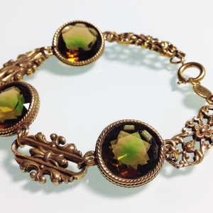 Винтажный браслет от "Accessocraft" с кристаллами оливкового цвета