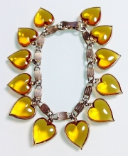 Винтажный чарм-браслет от ''Warner'' с чармами в форме сердец янтарного цвета