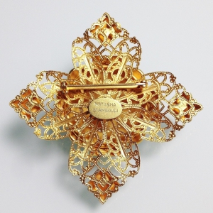 Винтажная брошь от "Natasha Stambouli" в форме креста