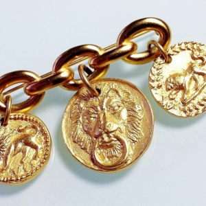 Винтажная брошь от Anne Klein со львами-монетками