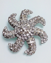 Винтажная брошь от "Weiss" в форме звезды-снежинки с австрийскими кристаллами прозрачного цвета