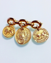 Винтажная брошь от Anne Klein со львами-монетками